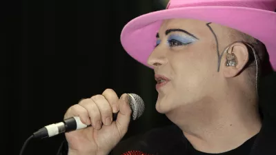 ** FILE ** In this Dec. 16, 2008 file photo, British singer Boy George performs onstage at Le Pigalle Club in central London. A British judge on Friday, Jan. 16, 2009 sentenced former Culture Club frontman Boy George to 15 months in jail after he was convicted of falsely imprisoning a male escort. (AP Photo/Joel Ryan, File)