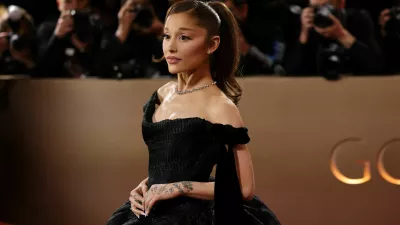 FILE PHOTO: Ariana Grande poses on the red carpet at the 83rd Annual Golden Globes in Beverly Hills, California, U.S., January 11, 2026. REUTERS/Daniel Cole/File Photo