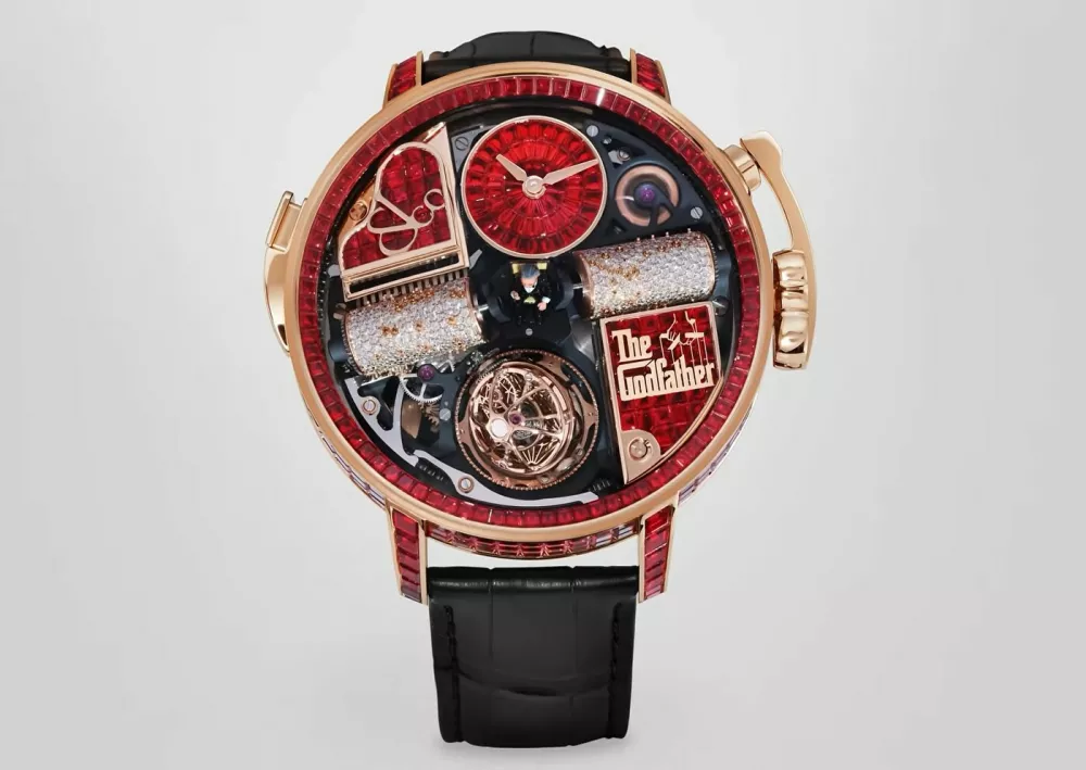 Ferrari Press AgencyGodfather 1Ref 1802906/08/2026See Ferrari textPictures MUST credit: Jacob & CoOstentatious jewellery company Jacob & Co has made a new timepiece tribute to classic movie The Godfather &mdash; including a miniature of star Marlon Brando as Mafia boss Don Vito Corleone.The $2.4 million USD timepiece is a one-off by the New York-based house.Called the Opera Godfather Baguette, it features a host of details from the 1972 Francis Ford Coppola masterpiece.A tiny, hand-sculpted figurine of Brando sitting in his iconic armchair sits right at the centre of the dial.A miniature rose gold piano sits on the dial, its keys moving while a music box plays the movie's signature GodfatherTheme, alongside a violin-shaped crank.The iconic poster puppet strings logo is integrated onto the dial plates. The watch is set with 461 red baguette sapphires across the 18 karat rose gold case, dial, crown and clasp.Each stone was individually cut to fit one position on the watch, a setting process that took craftsmen " months " to complete. Jacob & Co said the gem-setting arrangement will never be replicated again. It took the brand over a year just to source and match the colour, quality, and consistency of the stones. The watch contains 658 components built entirely by hand, combining high-end watchmaking with micro-mechanical engineering.OPS: The Opera Godfather Baguette watch.Picture supplied by Ferrari,Image: 1121010634, License: Rights-managed, Restrictions:, Model Release: no 