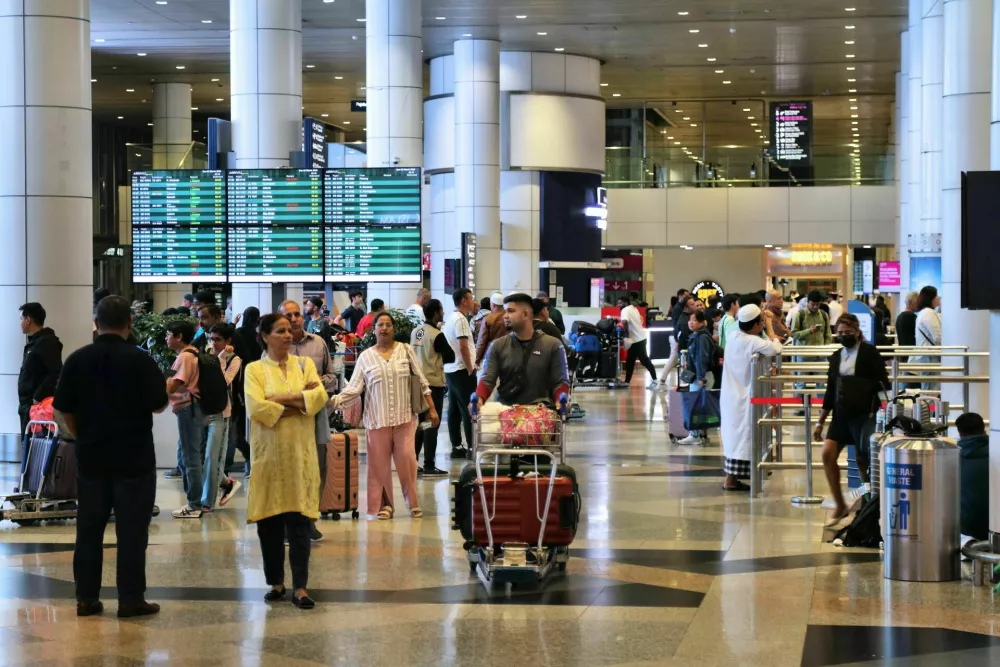 Passengers visit terminal of Kuala Lumpur International Airport in Malaysia. / Foto: Tupungato