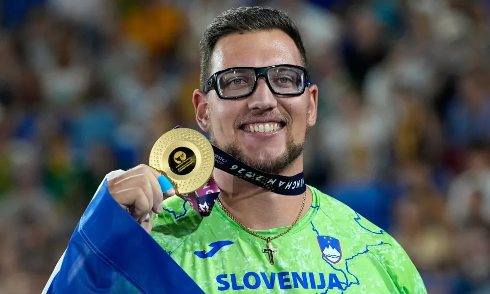 Kristjan Ceh of Slovenia poses after winning the gold medal in the men's discus throw final at the European Athletics Championships in Birmingham, England, Thursday, Aug. 13, 2026. (AP Photo/Matthias Schrader)