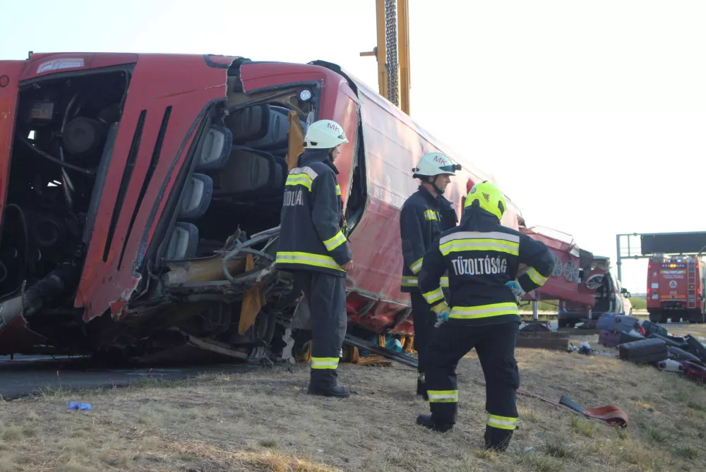 Firefighters work on the scene of a deadly accident, where a Polish bus carrying tourists veered off the motorway and overturned, near Mezokeresztes, Hungary, in this handout image released on August 16, 2026. Balazs Toth/Mezokovesd Kepekben/Handout via REUTERS THIS IMAGE HAS BEEN SUPPLIED BY A THIRD PARTY. FOR EDITORIAL USE ONLY. NO RESALES. NO ARCHIVES. MANDATORY CREDIT