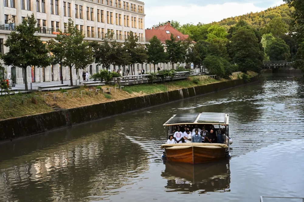 Los Angeles Lakers star Luka Doncic takes his teammates on a sightseeing boat tour of Ljubljana during the team's visit to the Slovenian capital. Doncic is hosting his Lakers teammates in his hometown as part of a four-day team gathering ahead of the new NBA season. The group toured the city by boat, taking in Ljubljana's historic city centre and landmarks along the Ljubljanica River.