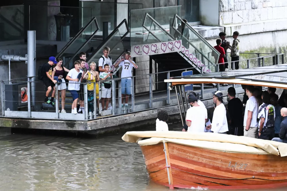 Fans greeting LA LakersLos Angeles Lakers star Luka Doncic takes his teammates on a sightseeing boat tour of Ljubljana during the team's visit to the Slovenian capital. Doncic is hosting his Lakers teammates in his hometown as part of a four-day team gathering ahead of the new NBA season. The group toured the city by boat, taking in Ljubljana's historic city centre and landmarks along the Ljubljanica River.