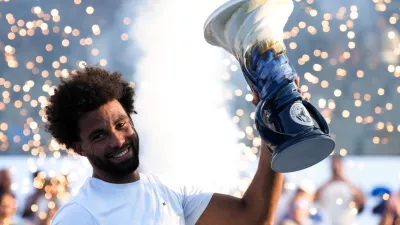 Aug 23, 2026; Cincinnati, OH, USA; Arthur Fils (FRA) celebrates with the Rookwood Cup after defeating Frances Tiafoe (USA) during the finals of the Cincinnati Open at Lindner Family Tennis Center. Mandatory Credit: Aaron Doster-Imagn Images