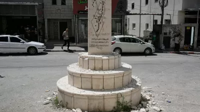 A damaged monument in the West Bank village of Madama, which bears the names of Palestinians killed in the Israeli-Palestinian conflict, including some identified by Israel as having been involved in attacks, after far-right Israeli lawmaker Zvi Sukkot of the Religious Zionism party smashed it, Tuesday, Aug. 25, 2026. (AP Photo/Majdi Mohammed)