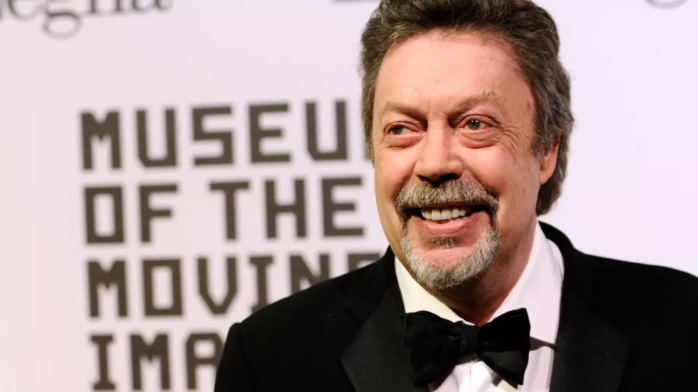 FILE - Tim Curry attends the Museum of the Moving Image salute to Alec Baldwin in New York on Feb. 28, 2011. (AP Photo/Peter Kramer, File)