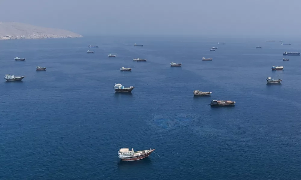A drone view shows vessels near the Strait of Hormuz, as seen from Musandam, Oman, August 28, 2026. REUTERS/Stringer