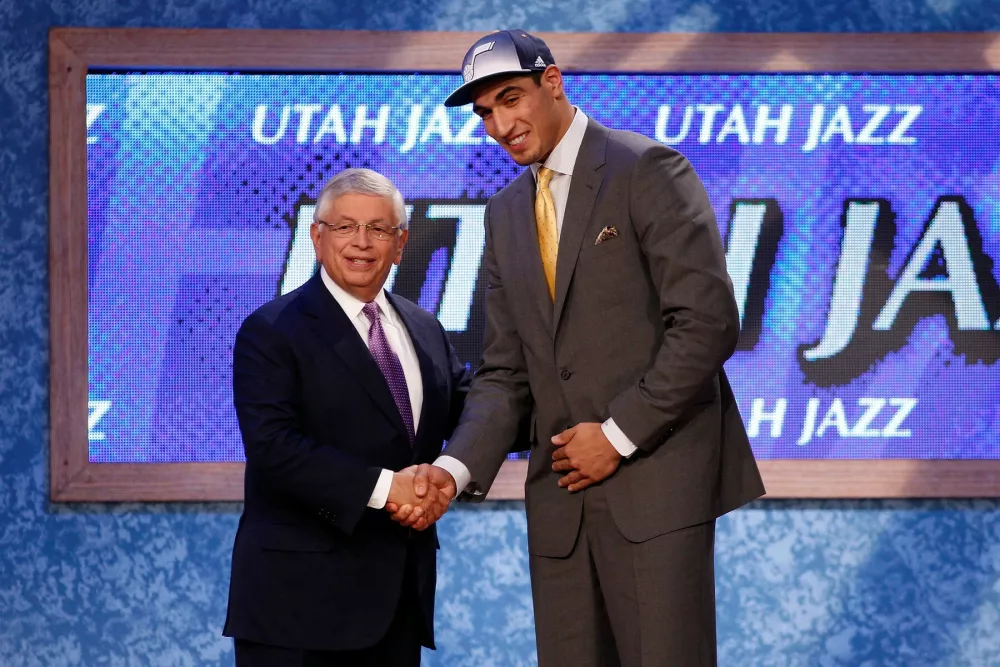 NEWARK, NJ - JUNE 23: Enes Kanter (R) from Istanbul, Turkey greets NBA Commissioner David Stern after he was selected #3 overall by the Utah Jazz in the first round during the 2011 NBA Draft at the Prudential Center on June 23, 2011 in Newark, New Jersey.,Image: 67104362, License: Rights-managed, Restrictions:, Model Release: no / Foto: Profimedia