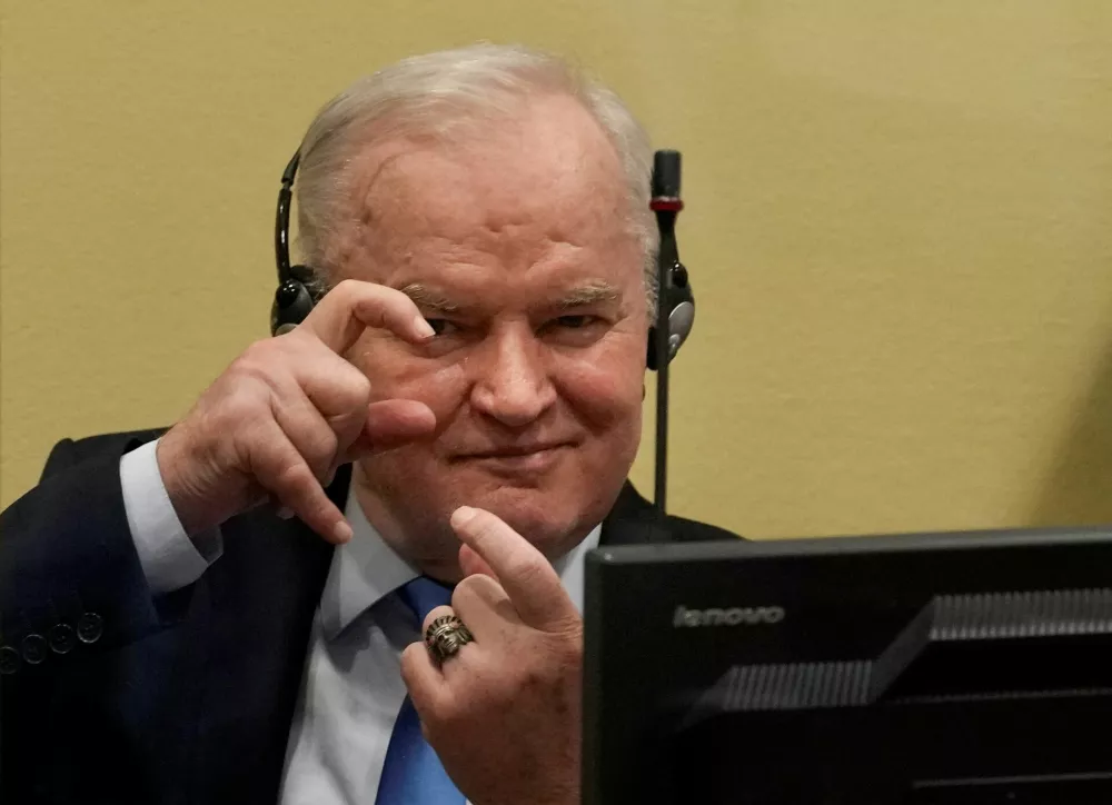 FILE PHOTO: Former Bosnian Serb military leader Ratko Mladic gestures prior to the pronouncement of his appeal judgement at the UN International Residual Mechanism for Criminal Tribunals (IRMCT) in The Hague, Netherlands June 8, 2021. Peter Dejong/Pool via REUTERS/File Photo