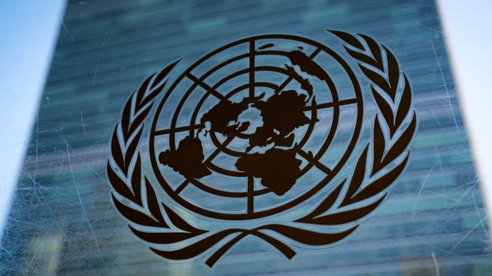FILE - The symbol of the United Nations is displayed outside the Secretariat Building, Feb. 28, 2022, at United Nations Headquarters. (AP Photo/John Minchillo, File)