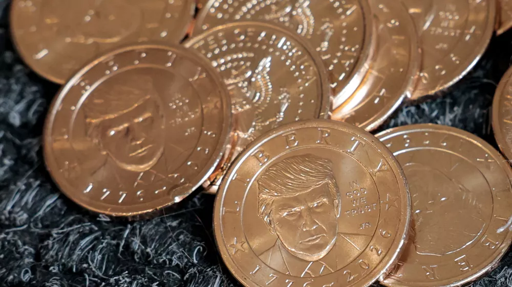 U.S. President Donald Trump's portrait on $1 coins, in honor of the nation's 250th anniversary of independence, on the day the coin is released for sale, is seen in this illustration taken, September 2, 2026. REUTERS/Kylie Cooper/Illustration