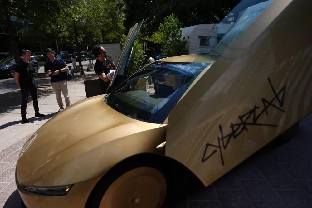 A Tesla Cybercab is displayed in downtown Austin, Texas, Thursday, Sept. 3, 2026. (AP Photo/Eric Gay)