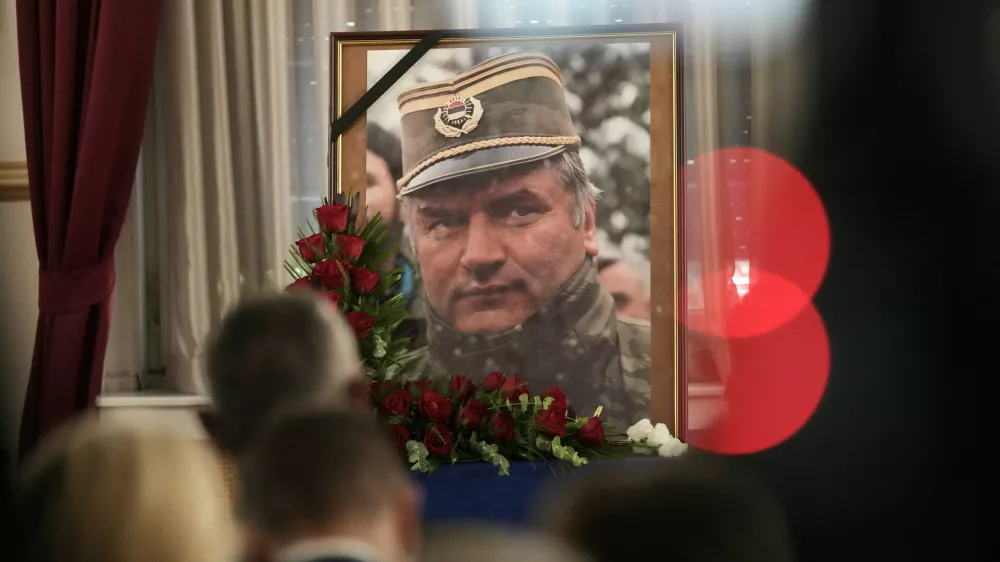 A photo of former Bosnian Serb wartime general Ratko Mladic is displayed during a commemoration ceremony in Belgrade, Serbia, Saturday, Sept. 5, 2026. (AP Photo/Darko Vojinovic)