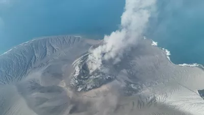 In this drone photo released by the Geological Agency (Badan Geologi) of Indonesia's Ministry of Energy and Mineral Resources, Mount Anak Krakatau spews volcanic smoke in Sunda Strait, Indonesia, Saturday, Sept. 5, 2026. (Badan Geologi via AP)