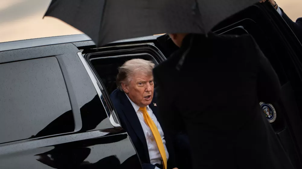 President Donald Trump gets out of the presidential SUV before boarding Air Force One, Friday, Sept. 4, 2026, at Joint Base Andrews, Md. (AP Photo/Julia Demaree Nikhinson)