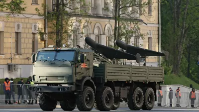 FILE PHOTO: An armoured truck transports Russia's Geran unmanned comabt aerial vehicles before a military parade on Victory Day, marking the 80th anniversary of the victory over Nazi Germany in World War Two, in Moscow, Russia, May 9, 2025. REUTERS/Shamil Zhumatov/File Photo