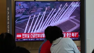 A TV screen shows a file photo of a North Korean missile launch during a news program at Seoul Railway Station in Seoul, South Korea, Saturday, Sept. 12, 2026. (AP Photo/Ahn Young-joon)