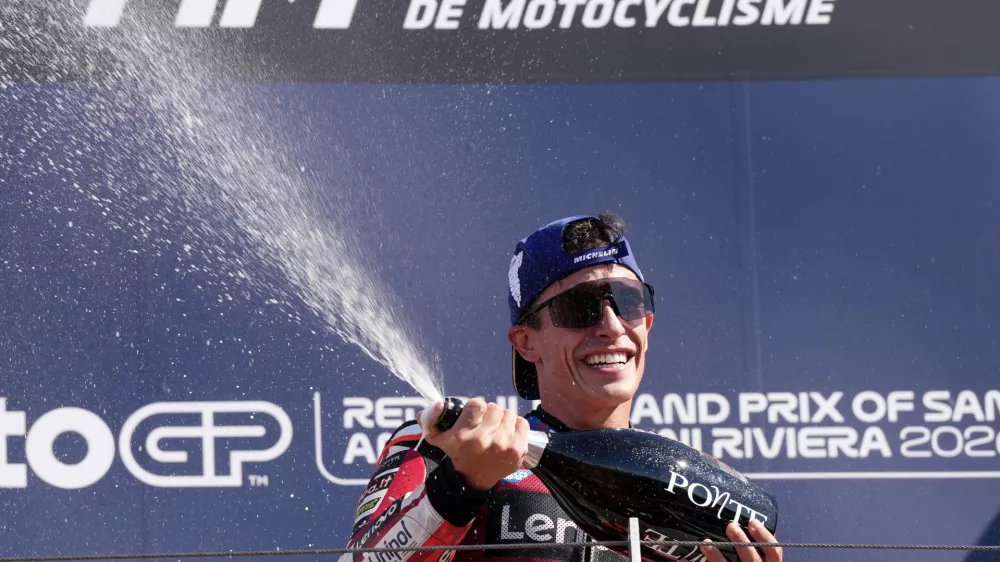 Spain's rider Marc Marquez of the Ducati Lenovo Team celebrates after winning the MotoGP race of the San Marino and the Rimini Riviera Grand Prix in Misano Adriatico, Italy, Sunday, Sept. 13, 2026. (AP Photo/Antonio Calanni)