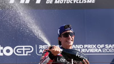 Spain's rider Marc Marquez of the Ducati Lenovo Team celebrates after winning the MotoGP race of the San Marino and the Rimini Riviera Grand Prix in Misano Adriatico, Italy, Sunday, Sept. 13, 2026. (AP Photo/Antonio Calanni)