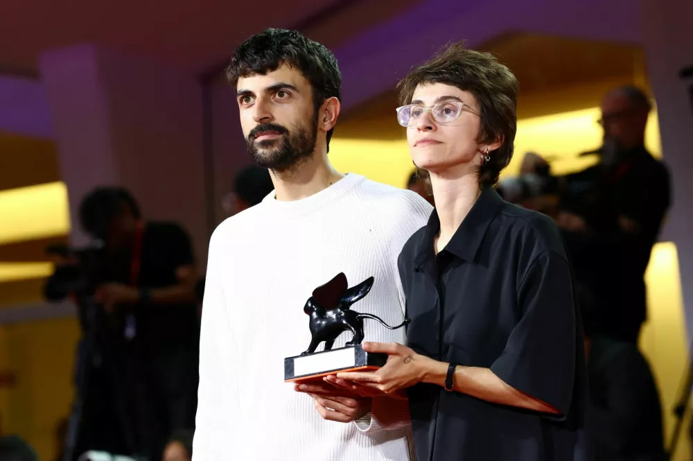Directors Yuval Abraham and Rachel Szor pose with the Special Jury Award for "Naza" during the closing ceremony of the 83rd Venice International Film Festival, Italy, September 12, 2026. REUTERS/Yves Herman