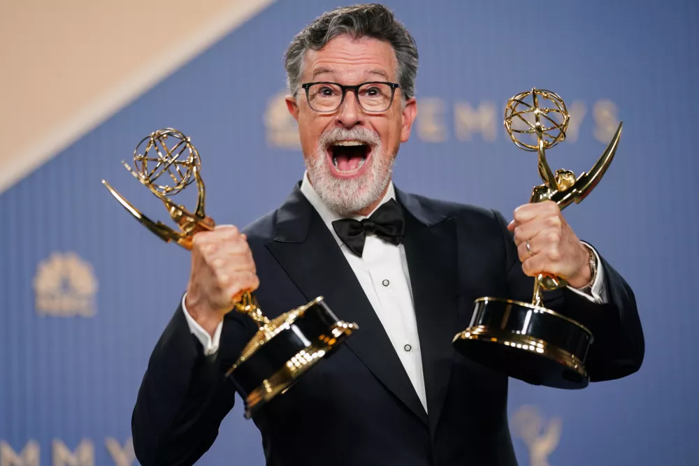 Stephen Colbert poses in the press room with the award for outstanding variety series for "The Late Show with Stephen Colbert" during the 78th Emmy Awards on Monday, Sept. 14, 2026, at the JW Marriott in Los Angeles. (Photo by Richard Shotwell/Invision/AP)