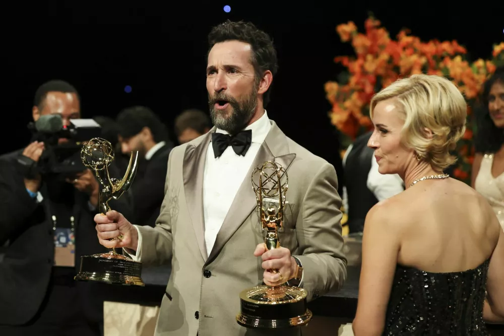 Noah Wyle, winner of the Outstanding Lead Actor in a Drama Series for "The Pitt", with his wife Sara Wells during the Governors Ball at the 78th Primetime Emmy Awards in Los Angeles, California, U.S., September 14, 2026. REUTERS/Mario Anzuoni