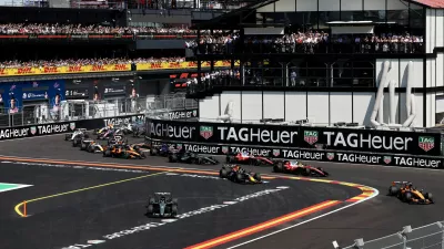 Formula One F1 - Spanish Grand Prix - Madring, Madrid, Spain - September 13, 2026 McLaren's Lando Norris leads into the first corner at the start of the race ahead of Mercedes' Andrea Kimi Antonelli REUTERS/Jakub Porzycki   TPX IMAGES OF THE DAY