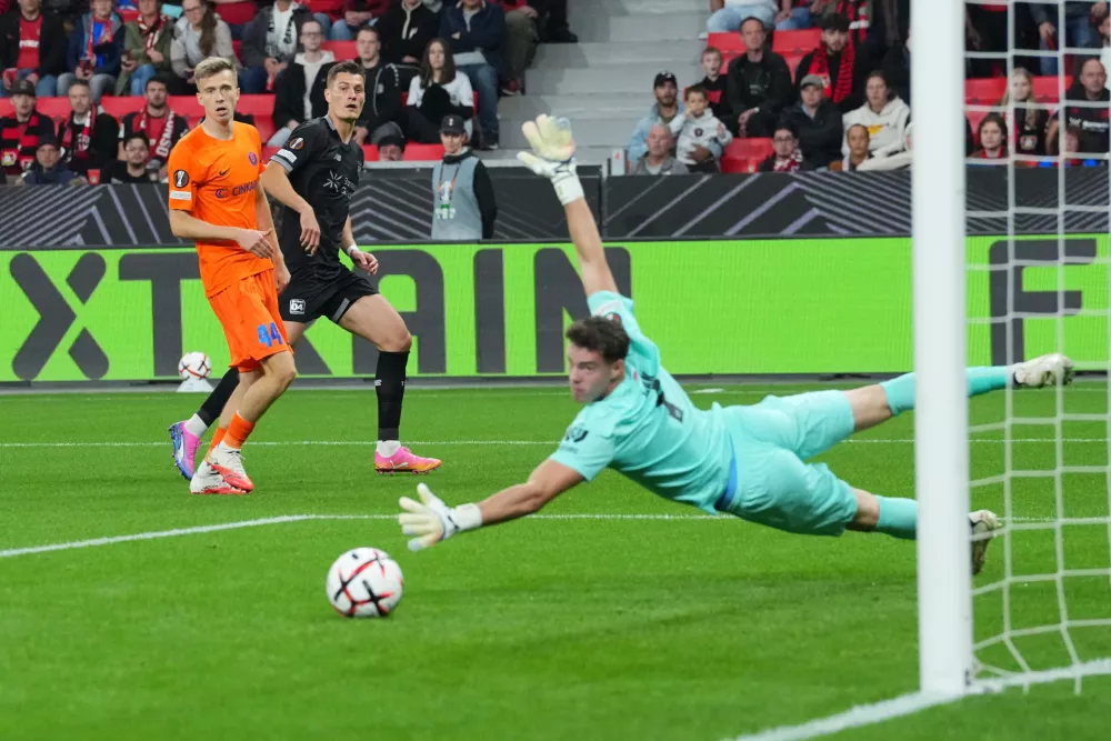 Leverkusen's Patrik Schick, center, fails to score during the Europa League opening phase soccer match between Bayer Leverkusen and NK Celje in Leverkusen, Germany, Wednesday, Sept. 16, 2026. (AP Photo/Martin Meissner)