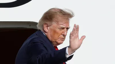 President Donald Trump waves as he boards Air Force One upon his departure at Joint Base Andrews, Md., Wednesday, Sept. 16, 2026. (AP Photo/Luis M. Alvarez)