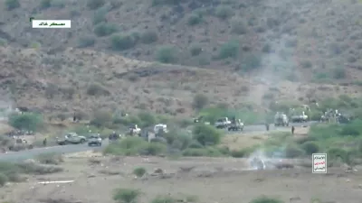 Smoke rises from a vehicle as armed men take to the streets at a location given as Khalid Camp, near Mocha, and said to show Houthi fighters firing towards government forces backed by Saudi Arabia, in Yemen, in this screengrab taken from a video released September 22, 2026. Al Masirah/Handout via REUTERS  THIS IMAGE HAS BEEN SUPPLIED BY A THIRD PARTY. TEXT OVERLAY FROM SOURCE.  REFILE - ADDED LOCATION AND CONTEXT. Verification: Reuters was able to verify the location from timecodes 0:21 to 0:28; 0:47 to 0:55; 01:42 to 01:50; 2:13 to 2:19 with the buildings, infrastructure and port layout that matched the archive and satellite imagery of the area. Location not verified from timecodes 0:00-0:20; 0:29- 0:46; 0:56-01:41; 01:51-2:12; 2:20- 3:03. The date when the videos were filmed was not verified. No old results were found posted online before September 22.