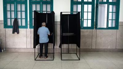 A man casts his vote inside a polling station during the legislative elections in Rabat, Morocco, Wednesday, Sept. 23, 2026. (AP Photo/Mosa'ab Elshamy)