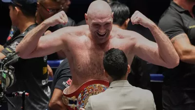 FILE - Tyson Fury, of England celebrates after winning against Mariusz Wach of Poland during a heavyweight charity bout at Max Muay Thai Stadium in Pattaya, Thailand, Friday, July 24, 2026. (AP Photo/Sakchai Lalit, File)