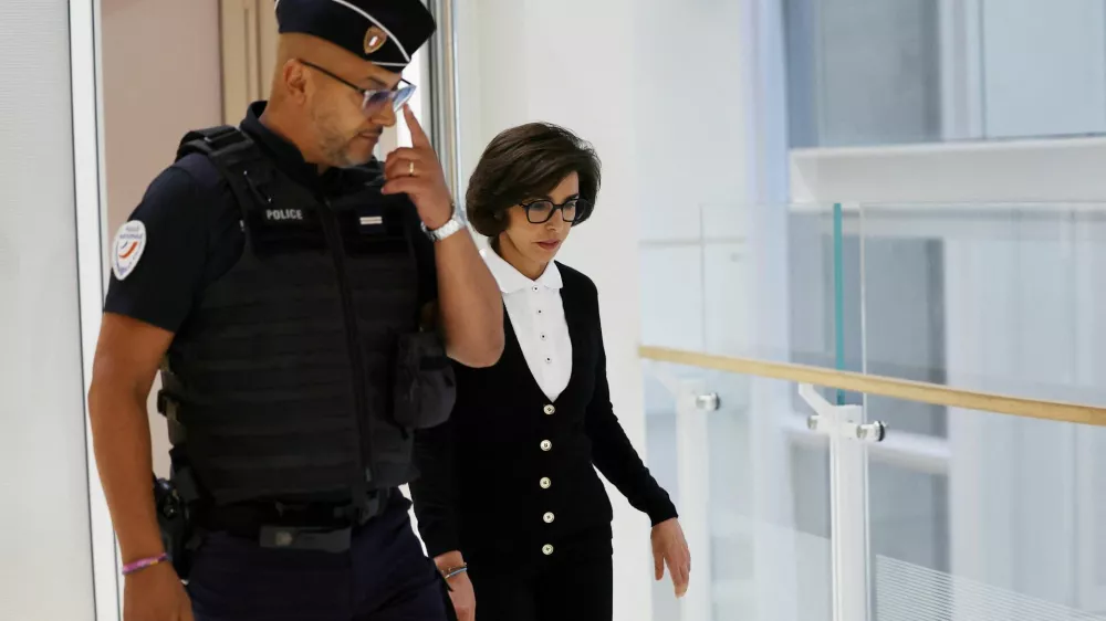 Rachida Dati, French politician and former Culture Minister, leaves during a break during the final day of hearings and closing arguments in her trial with former Renault-Nissan chairman and CEO Carlos Ghosn on corruption and abuse-of-power charges related to consulting fees, at the courthouse in Paris, France, September 28, 2026. REUTERS/Abdul Saboor