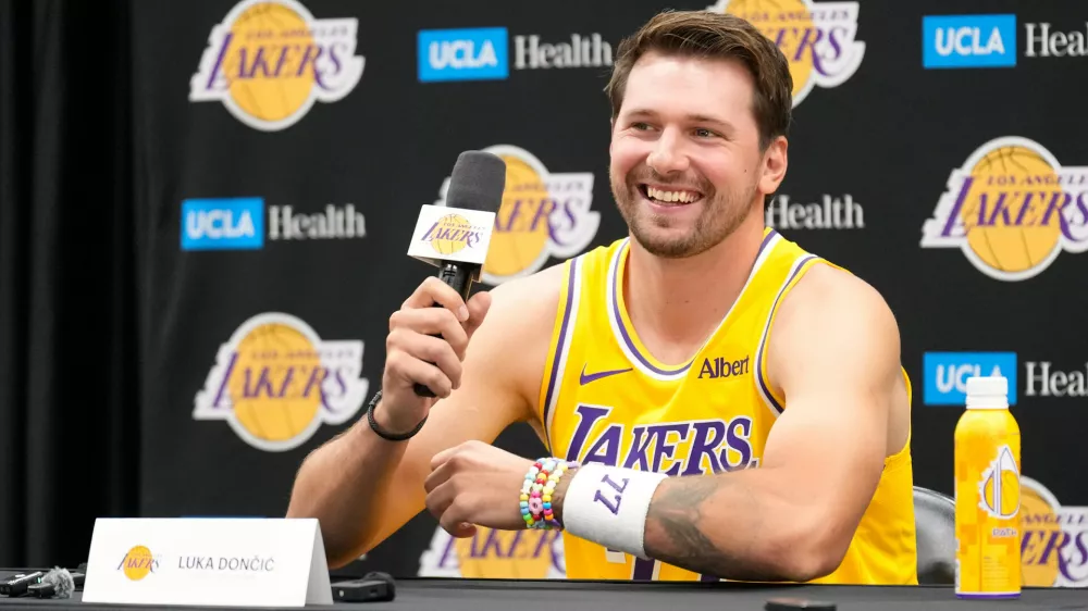 Los Angeles Lakers guard Luka Doncic gestures as he speaks to the media during media day Monday, Sept. 28, 2026, in El Segundo, Calif. (AP Photo/Mark J. Terrill)