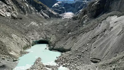 FILE PHOTO: A drone view shows meltwater forming a small lake at the tongue of the Mont Mine glacier on a warm summer day amid climate change in Ferpecle near Evolene, Switzerland, September 3, 2026. REUTERS/Denis Balibouse/File photo