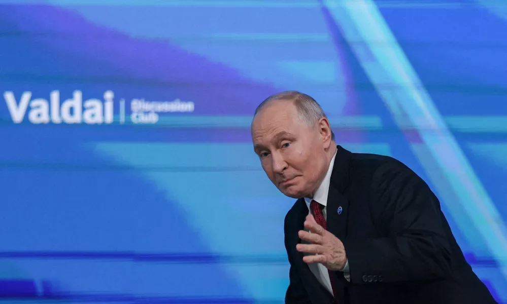 Russian President Vladimir Putin gestures as he attends a plenary session of the Valdai Discussion Club in Moscow, Russia, October 1, 2026. REUTERS/Ramil Sitdikov   TPX IMAGES OF THE DAY