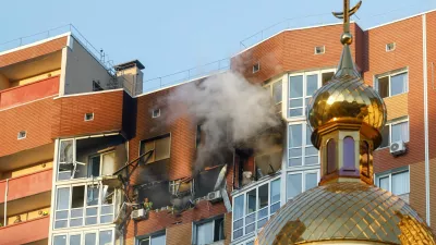 Smoke rises from an apartment building which was hit by a Russian drone strike, amid Russia's attack on Ukraine, in Kyiv, Ukraine October 2, 2026. REUTERS/Valentyn Ogirenko