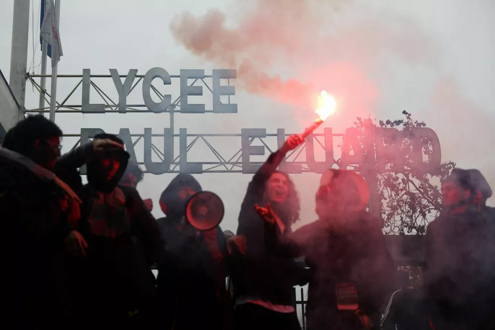 French high school students block the access to the Lycee Paul Eluard high school as they protest to demand the hiring of substitute teachers, increased resources and better learning conditions, in Saint-Denis, near Paris, France, September 30, 2026. REUTERS/Abdul Saboor