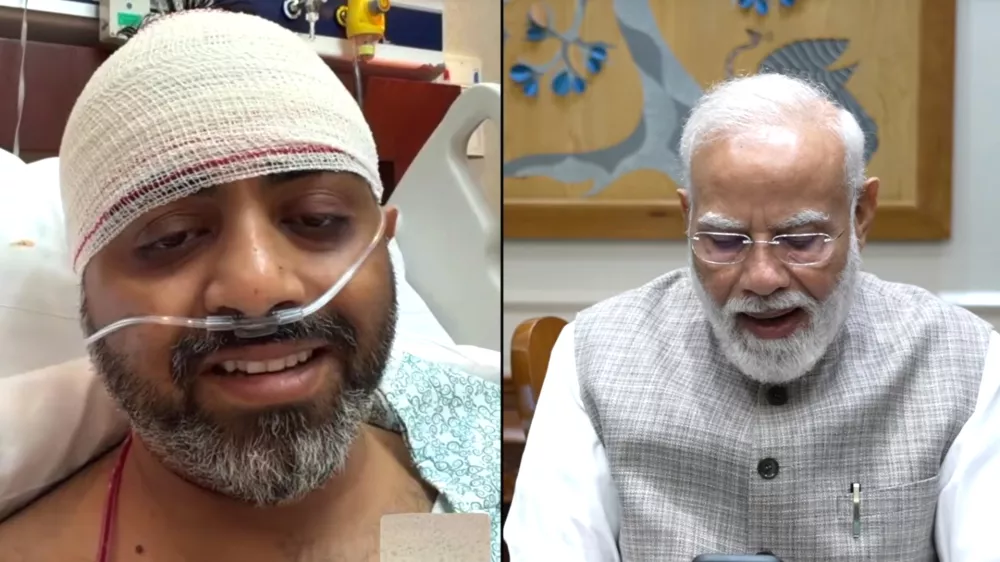 This screengrab from Narendra Modi YouTube Channel shows Indian Prime Minister Narendra Modi speaking with FlyDubai pilot Capt. Smit Machchhar on Friday, Oct. 2, 2026. (Narendra Modi YouTube Channel via AP)