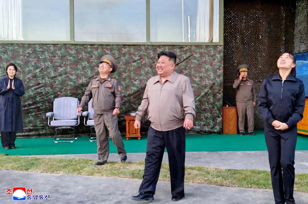 North Korean leader Kim Jong Un, accompanied by his daughter Kim Ju Ae, attends to oversee the firing of an intermediate-range missile from the eastern region of the country toward the East Sea during a drill in North Korea, October 3, 2026, in this picture released by North Korea's official Korean Central News Agency. KCNA via REUTERS  ATTENTION EDITORS - THIS IMAGE WAS PROVIDED BY A THIRD PARTY. REUTERS IS UNABLE TO INDEPENDENTLY VERIFY THIS IMAGE. NO THIRD PARTY SALES. SOUTH KOREA OUT. NO COMMERCIAL OR EDITORIAL SALES IN SOUTH KOREA.   TPX IMAGES OF THE DAY