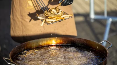IMAGE DISTRIBUTED FOR IDAHO POTATO COMMISSION - Fresh-cut Idaho® potatoes are fried onsite during an attempt by the Idaho Potato Commission and Spud Daddy to break the Guinness World Records title for the largest serving of French fries at Boise Potato Days in Boise, Idaho, on Friday, Oct. 2, 2026. (Kyle Green/AP Content Services for Idaho Potato Commission)