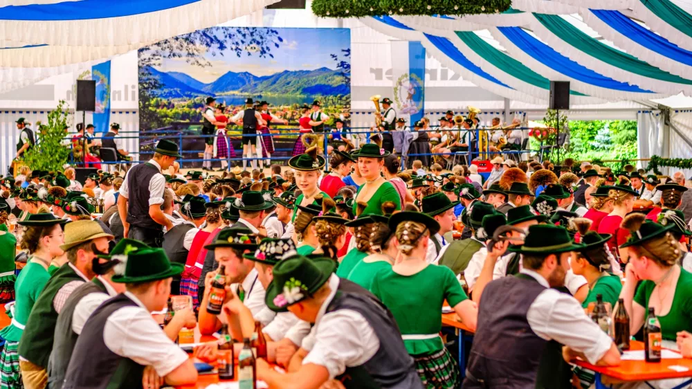 Schliersee, Germany - July 21: people with typical bavarian clothes at a festival in a beertent (Gaufest) in Schliersee on July 21, 2024