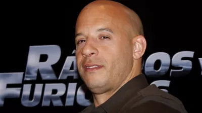 U.S. actor Vin Diesel gestures as he poses for photographers during an event to promote his new film "Fast and Furious" in Mexico City, Friday, March. 27, 2009. (AP Photo/Marco Ugarte)