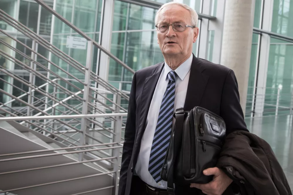 August Hanning, the former president of the Federal Intelligence Service (BND), arrives at the German parliament Bundestag in Berlin on Oct. 2, 2015. (Michael Kappeler/dpa via AP)
