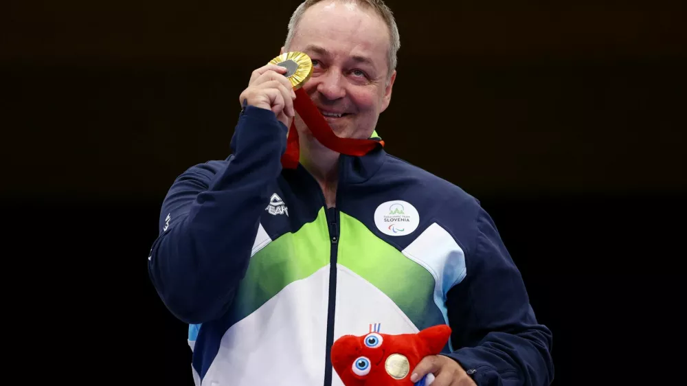 Paris 2024 Paralympics - Shooting - R4 - Mixed 10m Air Rifle Standing SH2 Final - Chateauroux Shooting Centre, Deols, France - August 30, 2024 Gold medallist Francek Gorazd Tirsek of Slovenia celebrates after the final REUTERS/Eng Chin An