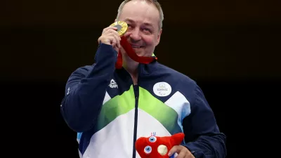 Paris 2024 Paralympics - Shooting - R4 - Mixed 10m Air Rifle Standing SH2 Final - Chateauroux Shooting Centre, Deols, France - August 30, 2024 Gold medallist Francek Gorazd Tirsek of Slovenia celebrates after the final REUTERS/Eng Chin An