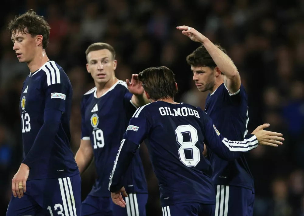 Soccer Football - Nations League - Group B1 - Scotland v Slovenia - Hampden Park, Glasgow, Scotland, Britain - October 6, 2026 Scotland's Ryan Christie celebrates scoring their first goal with Billy Gilmour REUTERS/Russell Cheyne