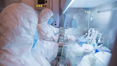This undated photo released in 2019 by the Irkutsk Anti-Plague Research Institute of Siberia and Far East, shows the institute workers in a lab. (The Irkutsk Anti-Plague Research Institute of Siberia and Far East via AP) ADDITION: adding photo was released in 2019
