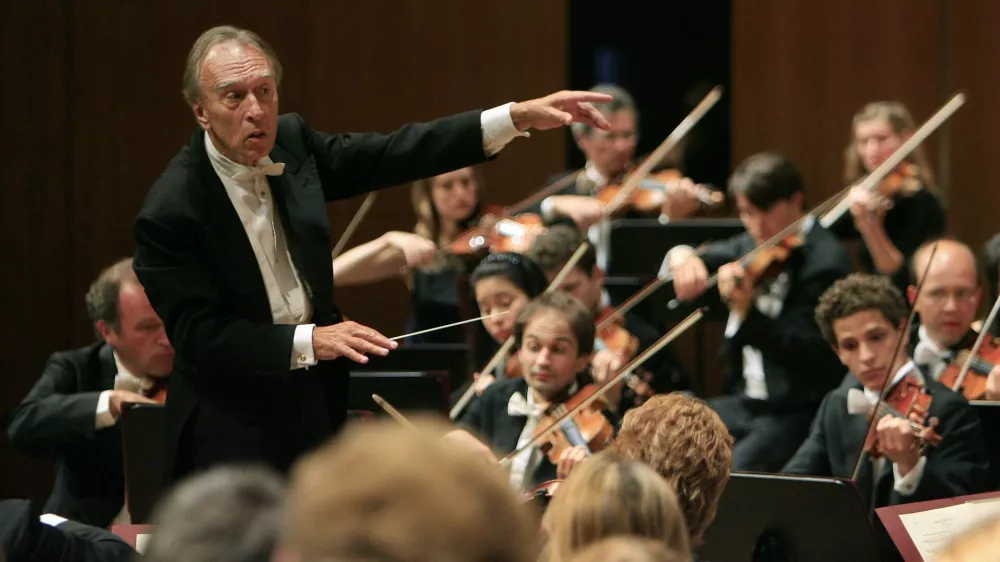FILE - In this Aug. 10, 2007 filer, conductor Claudio Abbado, left, conducts his orchestra during the opening concert of the Lucerne Festival in Lucerne, Switzerland. Claudio Abbado, a star in the great generation of Italian conductors who was revered by musicians in the world's leading orchestras for developing a strong rapport with them while still allowing them their independence, has died Monday, Jan. 20, 2104. He was 80. Abbado made his debut in 1960 at La Scala in his home city of Milan and went on to be its musical director for nearly 20 years. Among his many other stints were as musical director of the Vienna State Opera, the Berlin Philharmonic and the London Symphony Orchestra and chief guest conductor of the Chicago Philharmonic. Even as he battled illness in his later years, Abbado founded his own all-star orchestra in Lucerne, Switzerland. (AP Photo/Eddy Risch, Keystone)